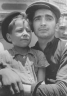 Elazar Schiff holding Yisrael Meir (Lulek) Lau, aboard RMS Mataroa, July 15, 1945